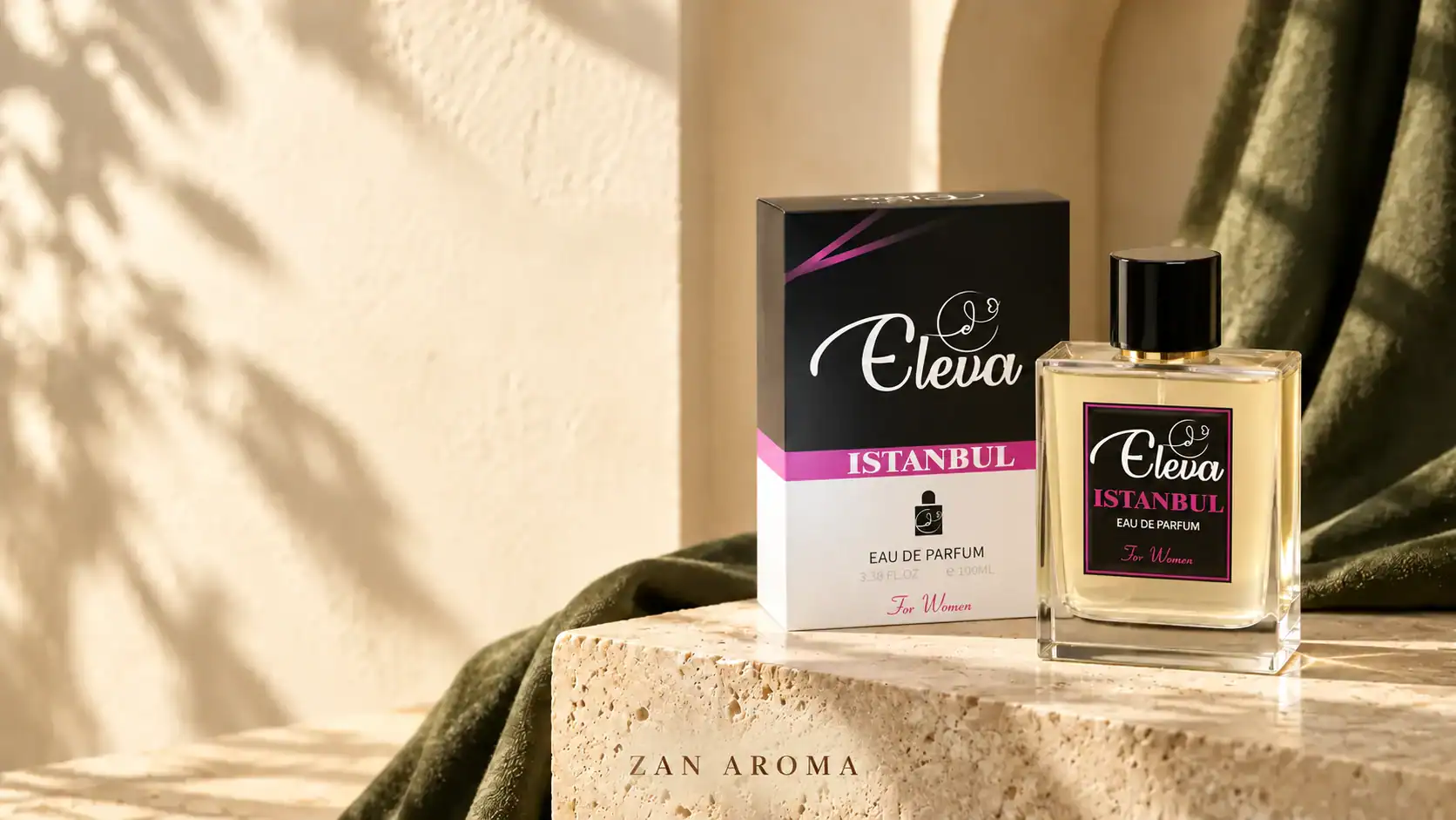 Flacon et coffret de parfum ELEVA ISTANBUL sur une pierre claire, près d’un tissu olive